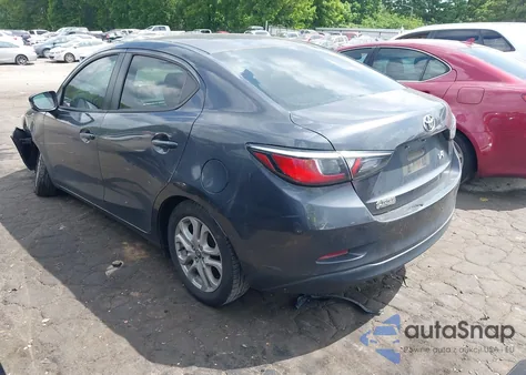 2017 Toyota Yaris Ia из США, поврежденный, VIN 3MYDLBYV3HY150188